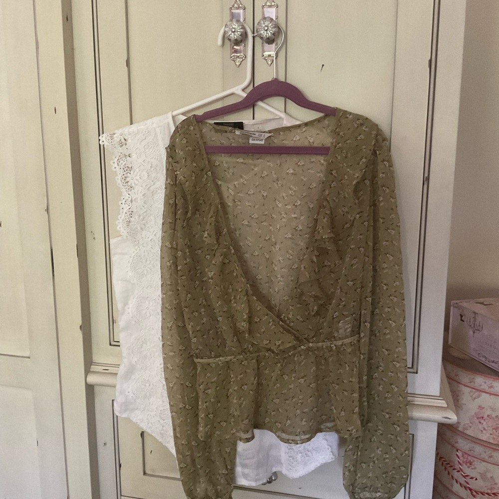 Sleeveless linen blouse and semi sheer floral blouse